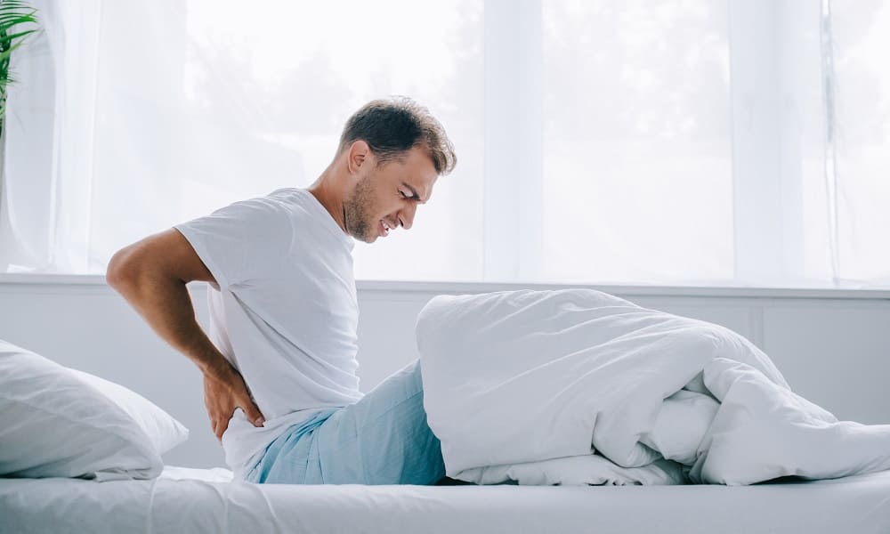 Почему болит спина после сна у женщин и мужчин